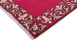 Backside of handmade 2000s Kashan rug showing knot structure and weave density