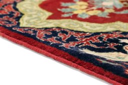 Central medallion detail of 1995s Kashan rug from Iran / Persia