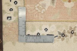 Corner detail of 1980s Kashmar rug showing border pattern and Wool pile
