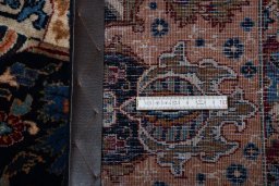 Corner detail of 2000s Kashmar rug showing border pattern and Wool pile