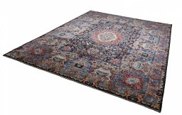 Close-up detail of 2000s Kashmar rug from Iran / Persia showing Wool weave