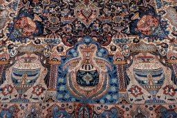 Backside of handmade 2000s Kashmar rug showing knot structure and weave density