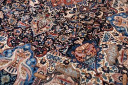 Close-up detail of 2000s Kashmar rug from Iran / Persia showing Wool weave