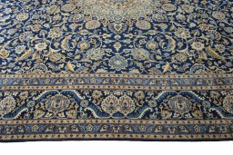 Corner detail of 2000s Kashmar rug showing border pattern and Wool pile