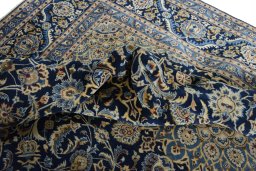 Surface texture of 2000s Kashmar rug with natural Wool and intricate pattern