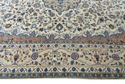 Corner detail of 2000s Kashmar rug showing border pattern and Wool pile