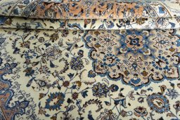 Close-up detail of 2000s Kashmar rug from Iran / Persia showing Wool weave