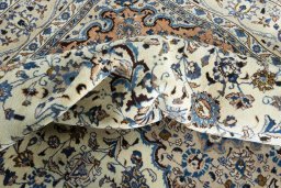 Surface texture of 2000s Kashmar rug with natural Wool and intricate pattern