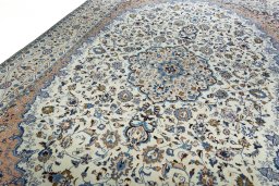 Backside of handmade 2000s Kashmar rug showing knot structure and weave density