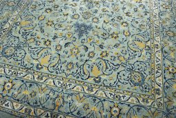 Close-up detail of 2000s Kashmar rug from Iran / Persia showing Wool weave