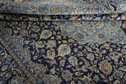 Close-up detail of 2000s Kashmar rug from Iran / Persia showing Wool weave