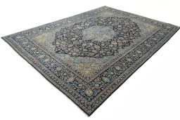 Corner detail of 2000s Kashmar rug showing border pattern and Wool pile