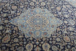 Central medallion detail of 2000s Kashmar rug from Iran / Persia
