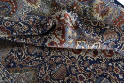 Surface texture of 2000s Kashmar rug with natural Wool and intricate pattern