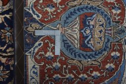 Backside of handmade 2000s Kashmar rug showing knot structure and weave density