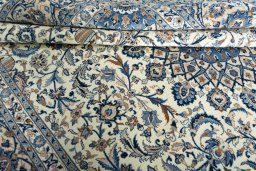 Close-up detail of 2000s Kashmar rug from Iran / Persia showing Wool weave