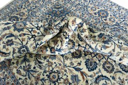 Surface texture of 2000s Kashmar rug with natural Wool and intricate pattern