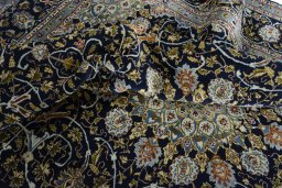 Surface texture of 2000s Kashmar rug with natural Wool and intricate pattern