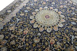 Backside of handmade 2000s Kashmar rug showing knot structure and weave density