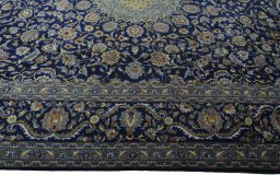 Corner detail of 2000s Kashmar rug showing border pattern and Wool pile