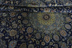 Close-up detail of 2000s Kashmar rug from Iran / Persia showing Wool weave