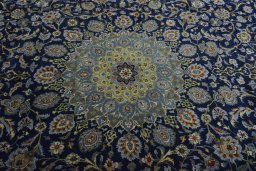 Central medallion detail of 2000s Kashmar rug from Iran / Persia