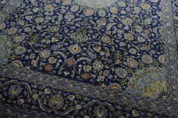 Close-up detail of 2000s Kashmar rug from Iran / Persia showing Wool weave