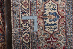 Surface texture of 2000s Kashmar rug with natural Wool and intricate pattern