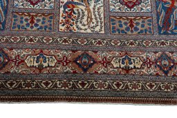 Close-up detail of 2000s Kashmar rug from Iran / Persia showing Wool weave