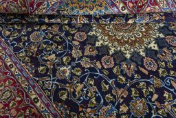 Close-up detail of 2000s Kashmar rug from Iran / Persia showing Wool weave