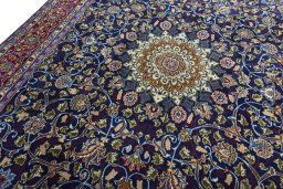 Backside of handmade 2000s Kashmar rug showing knot structure and weave density