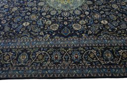 Corner detail of 2000s Kashmar rug showing border pattern and Wool pile