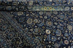Close-up detail of 2000s Kashmar rug from Iran / Persia showing Wool weave