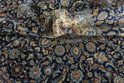 Surface texture of 2000s Kashmar rug with natural Wool and intricate pattern