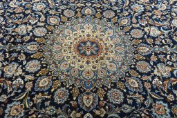 Central medallion detail of 2000s Kashmar rug from Iran / Persia