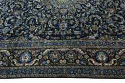Corner detail of 2000s Kashmar rug showing border pattern and Wool pile
