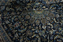 Close-up detail of 2000s Kashmar rug from Iran / Persia showing Wool weave