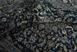 Surface texture of 2000s Kashmar rug with natural Wool and intricate pattern