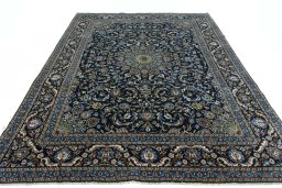 Surface texture of 2000s Kashmar rug with natural Wool and intricate pattern