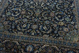 Close-up detail of 2000s Kashmar rug from Iran / Persia showing Wool weave