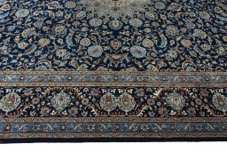 Corner detail of 2000s Kashmar rug showing border pattern and Wool pile