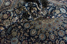 Surface texture of 2000s Kashmar rug with natural Wool and intricate pattern