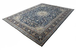 Corner detail of 2000s Kashmar rug showing border pattern and Wool pile