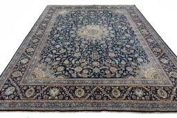 Surface texture of 2000s Kashmar rug with natural Wool and intricate pattern