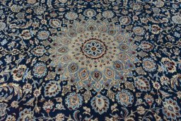 Central medallion detail of 2000s Kashmar rug from Iran / Persia