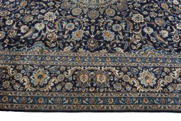 Corner detail of 2000s Kashmar rug showing border pattern and Wool pile