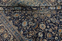 Close-up detail of 2000s Kashmar rug from Iran / Persia showing Wool weave