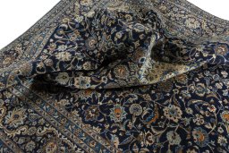 Surface texture of 2000s Kashmar rug with natural Wool and intricate pattern
