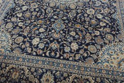 Close-up detail of 2000s Kashmar rug from Iran / Persia showing Wool weave