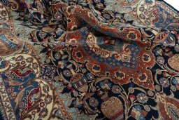 Surface texture of 1970s Kashmar rug with natural Wool and intricate pattern